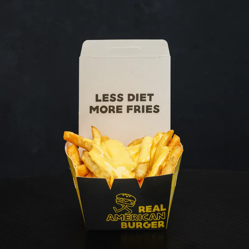 Papas fritas con cheddar